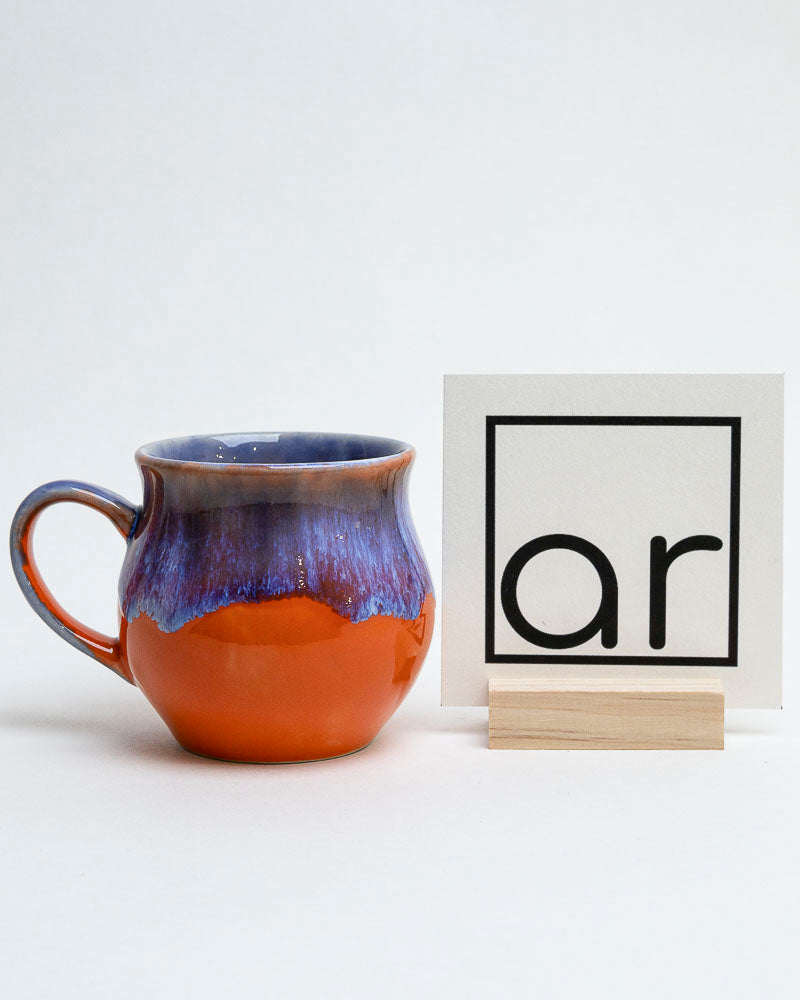 Kubek zachód nad glinianym brzegiem